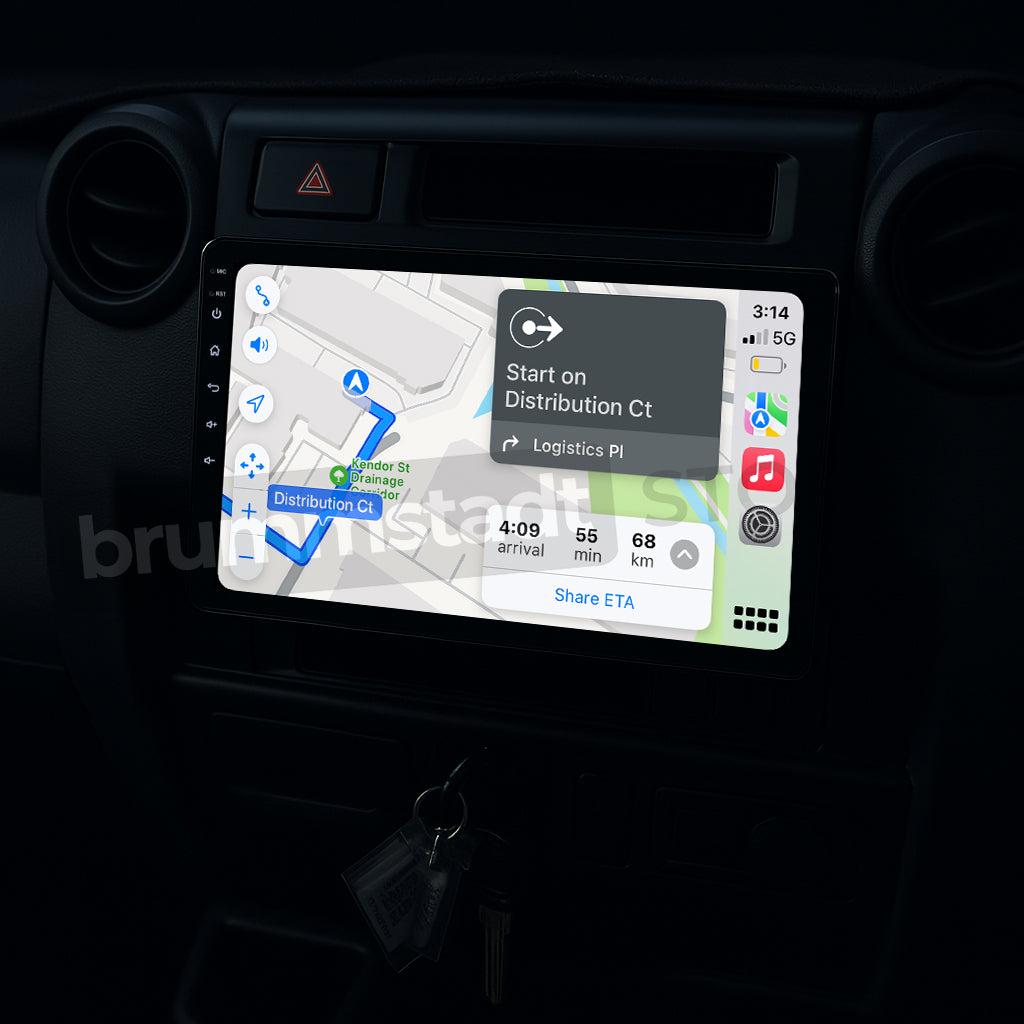 Brummstadt, Toyota Land Cruiser 70 Series 1984-2025, showcasing Apple CarPlay interface with Maps app displaying route to Distribution Ct, estimated arrival in 4:09, distance 55 km, speed 68 km/h, visible app icons include Phone, Music, and Messages, top-right corner shows time 3:14, 5G network, full battery, Toyota Land Cruiser 70 Series 1984-2025, Brummstadt premium head unit upgrade.