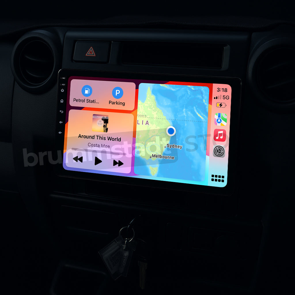Brummstadt, Toyota Land Cruiser 70 76 78 79 Series 1984-2025, featuring Apple CarPlay interface, displaying map of Sydney, Australia, with visible apps including Maps, Music, and Parking. The screen shows a 5G network indicator, time, and location pin. The layout includes a vibrant, user-friendly interface with easy access to navigation and entertainment options, enhancing driving experience.