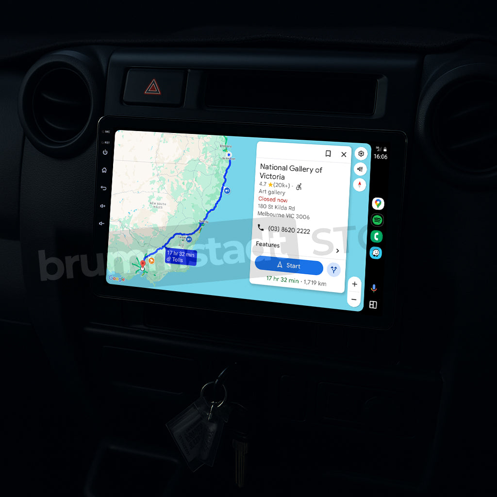 Brummstadt, Toyota Land Cruiser 70 1984-2025, showcasing Apple CarPlay interface, Toyota Land Cruiser 70, featuring a large touchscreen displaying Apple Maps with a route to the National Gallery of Victoria, visible icons for phone, music, and messages, time and battery indicators, sleek design with intuitive navigation, Brummstadt's premium infotainment upgrade enhancing user experience with seamless connectivity and modern features.