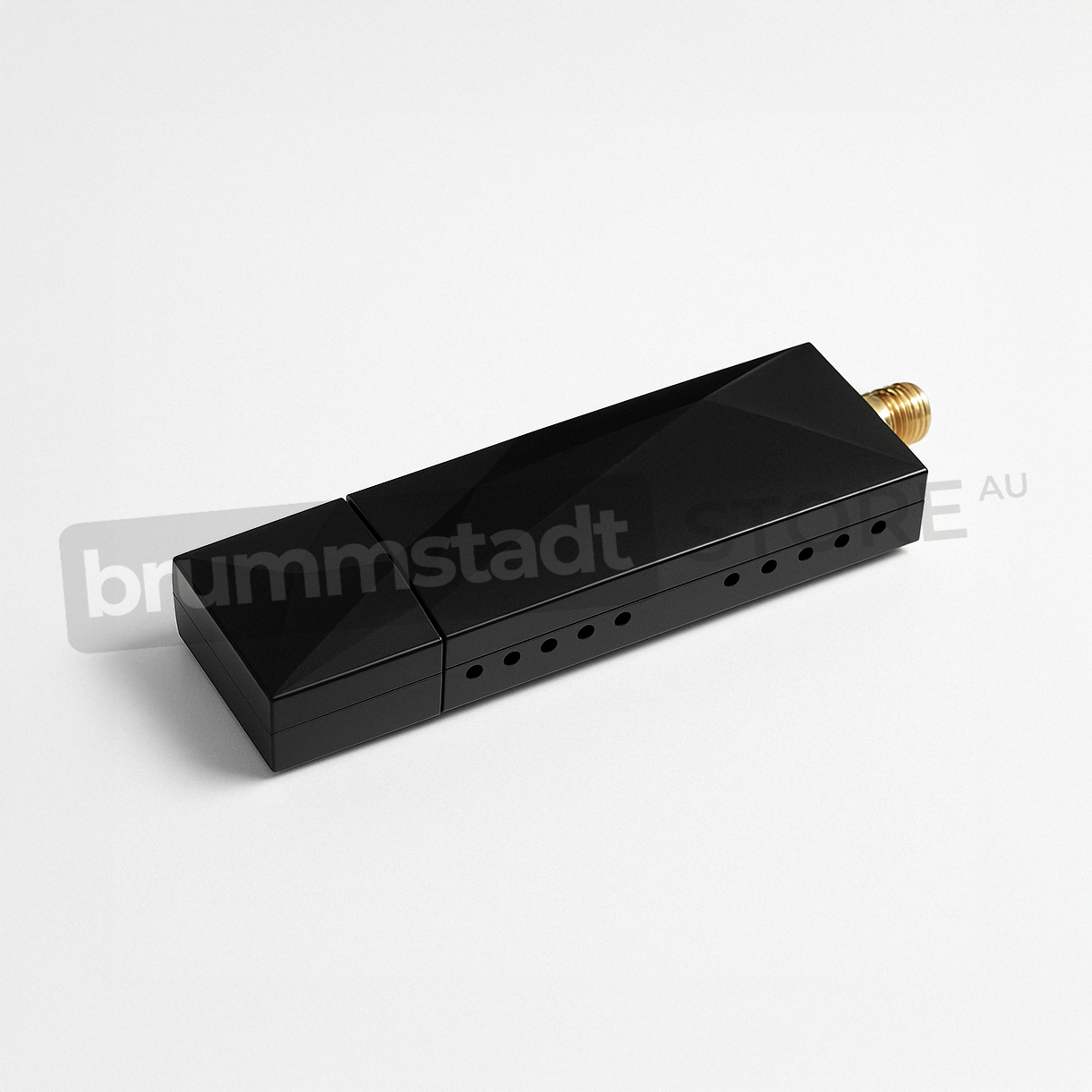 Brummstadt DAB+ digital radio module with USB connection – sleek black design with geometric contours, coaxial antenna port, and ventilation holes for optimal performance.