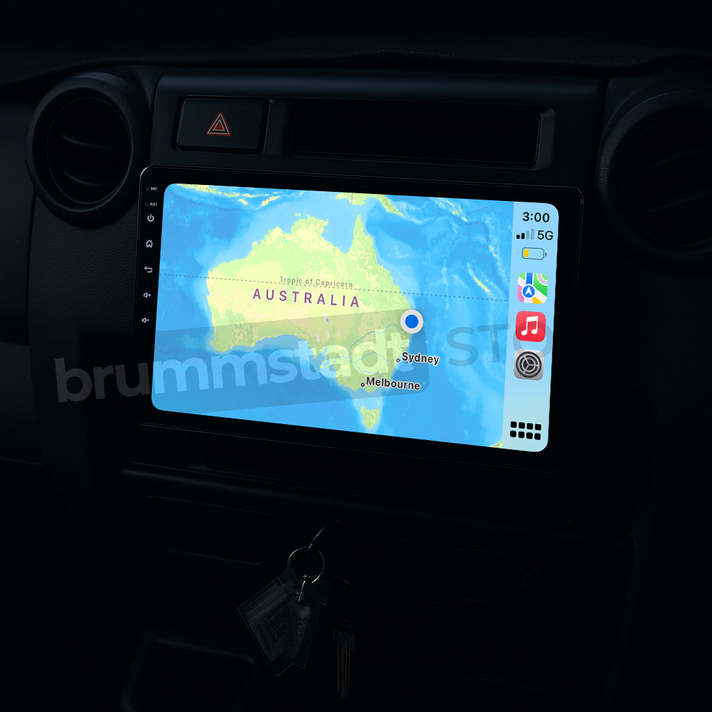 Brummstadt, Toyota Land Cruiser 70 Series 1984-2025, featuring Apple CarPlay interface, Toyota Land Cruiser 70 Series, displaying a map of Australia with a location pin on Sydney, visible apps include Maps, Phone, Music, and Messages, time displayed as 3:09, 5G network signal, battery icon, sleek modern design, intuitive touch interface, Brummstadt upgrade kit enhances user experience with seamless connectivity.