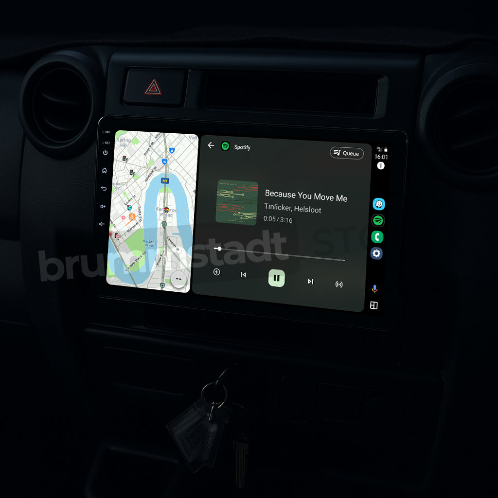 Brummstadt, Toyota Land Cruiser 70 Series 1984-2025, showcasing Apple CarPlay interface, Toyota Land Cruiser 70 Series, featuring Spotify app playing "Because You Move Me" by Tinlicker & Helsloot, navigation map on left, music controls on right, sleek dashboard integration, prominent app icons, clear display, user-friendly layout, enhancing driving experience with seamless connectivity, Brummstadt.