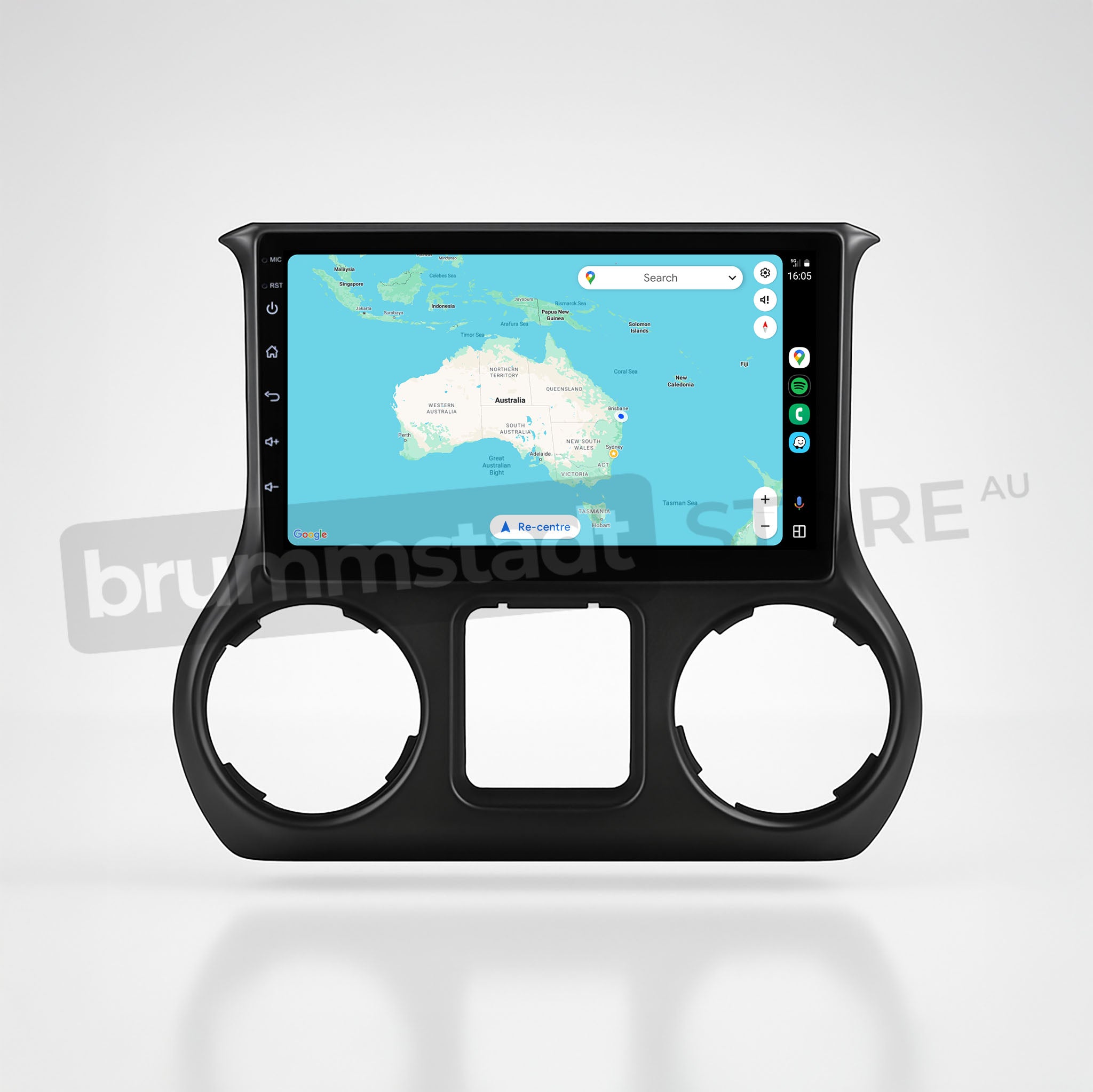 Brummstadt, Jeep Wrangler 2015-2019, showcasing a premium head unit upgrade kit with Apple CarPlay interface. The display features a map of Australia, search bar, and navigation options. Visible icons include home, back, and app switcher. The unit is designed for seamless integration into the Jeep Wrangler dashboard, enhancing user experience with wired and wireless connectivity options.